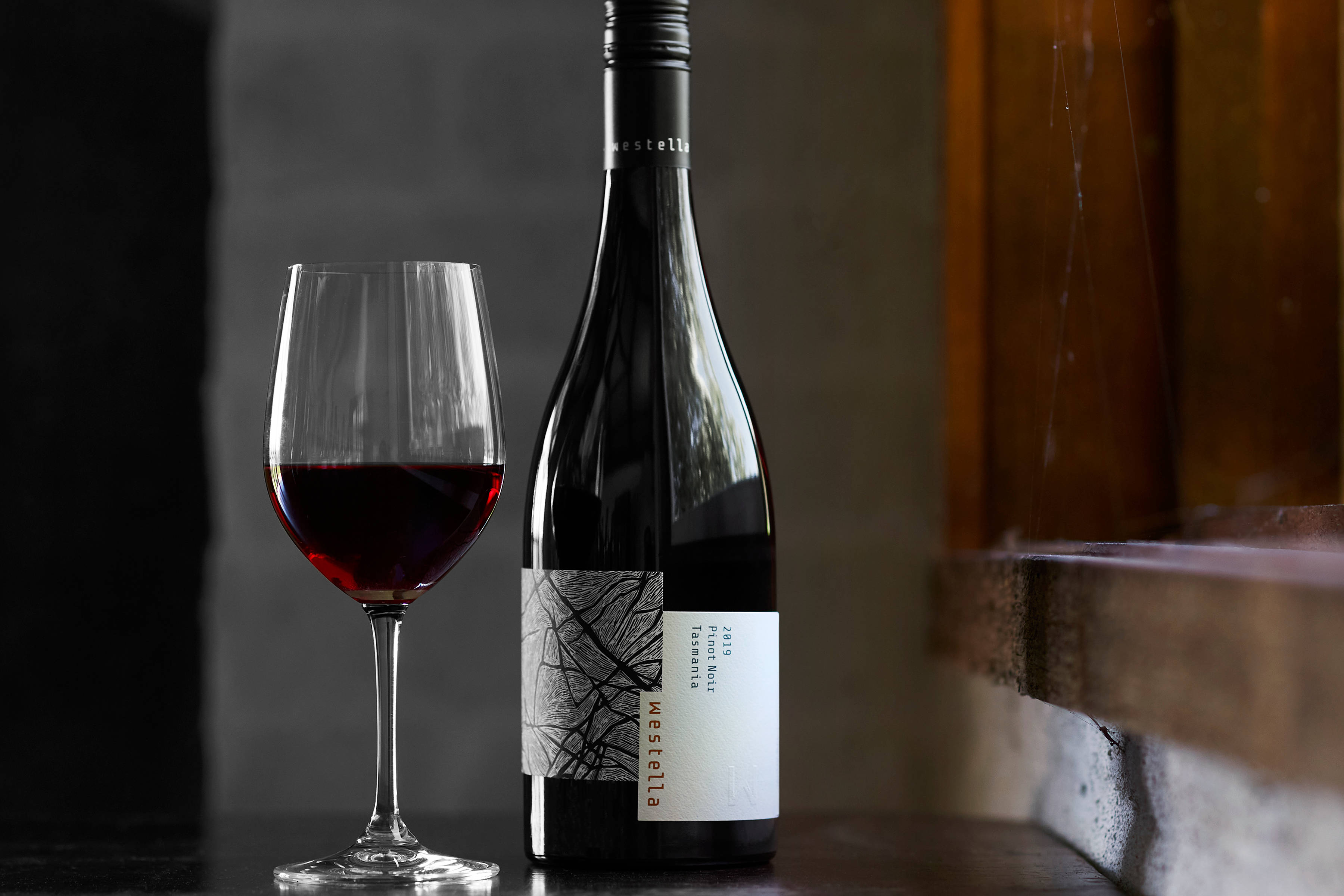 Glass of Pinot Noir and bottle of Westella’s 2019 Pinot Noir. Photo: Renee Hodskiss.